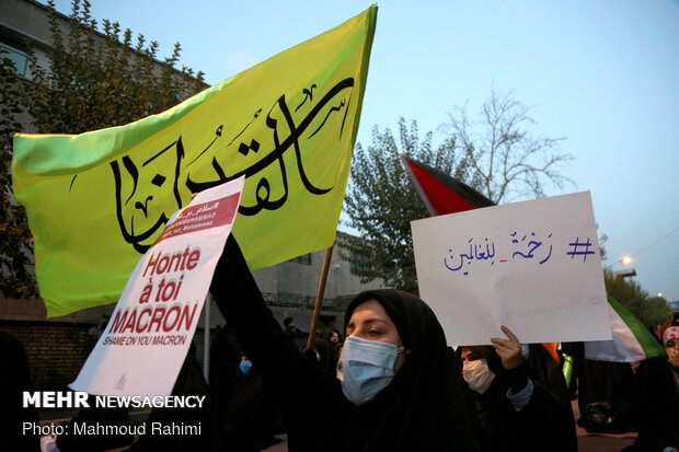 People hold protest in front of French Embassy in Tehran 