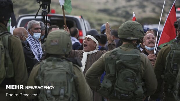 Zionist army attacks Palestinians march against annexation
