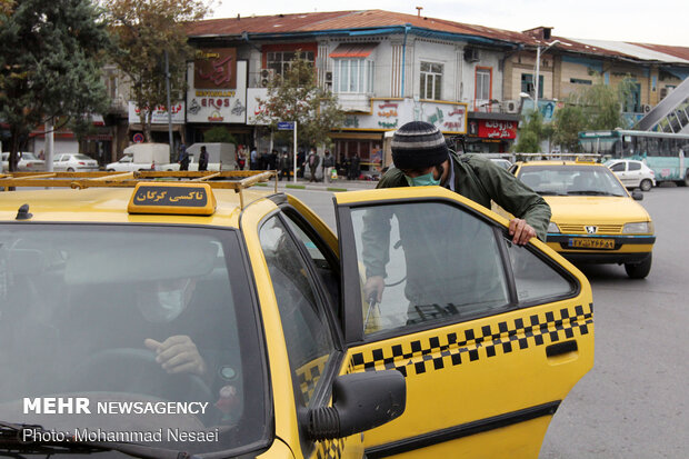 Disinfecting public transportation fleet in Gorgan
