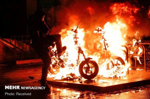 Violence erupts in Paris protest against security law(+video)