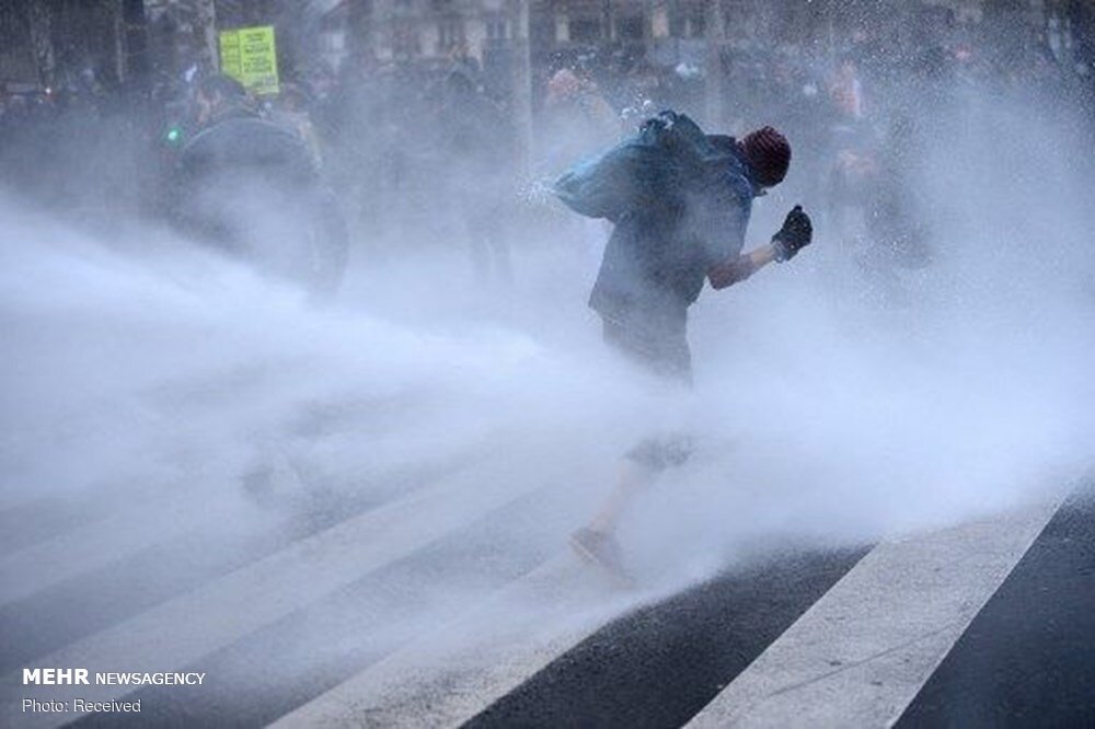 French police attack protesters in Paris on new security law 