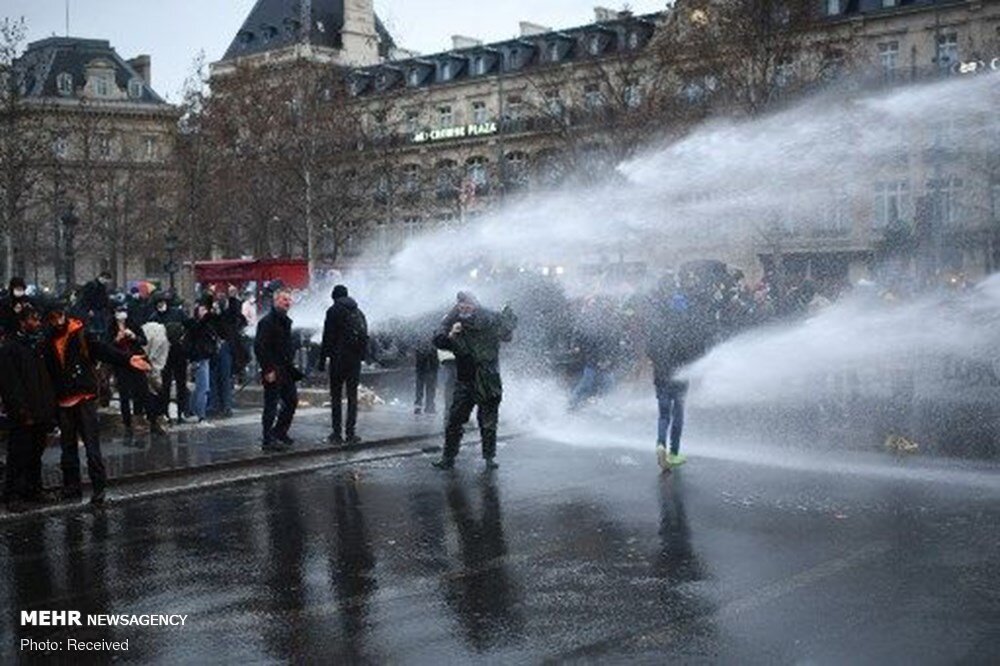 French police attack protesters in Paris on new security law 