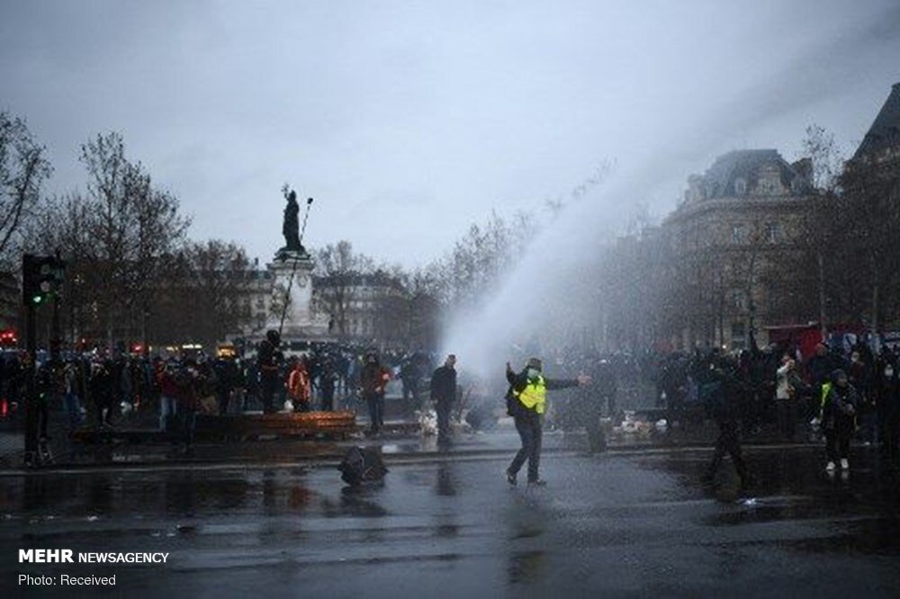 French police attack protesters in Paris on new security law 