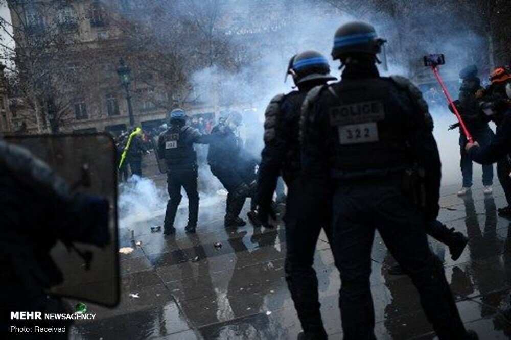 French police attack protesters in Paris on new security law 