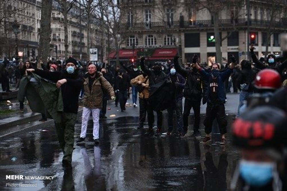French police attack protesters in Paris on new security law 