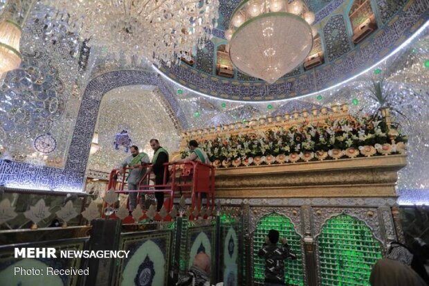 Imam Ali’s holy shrine ornamented with flowers
