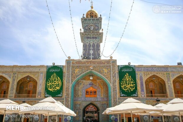 Imam Ali’s holy shrine ornamented with flowers
