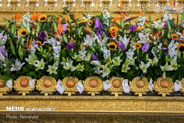 Imam Ali’s holy shrine ornamented with flowers
