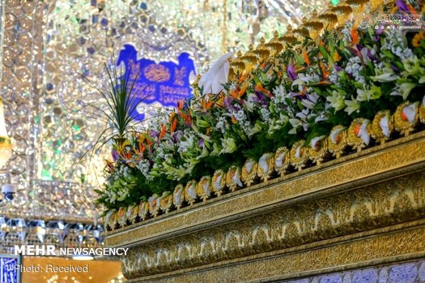 Imam Ali’s holy shrine ornamented with flowers
