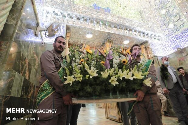 Imam Ali’s holy shrine ornamented with flowers
