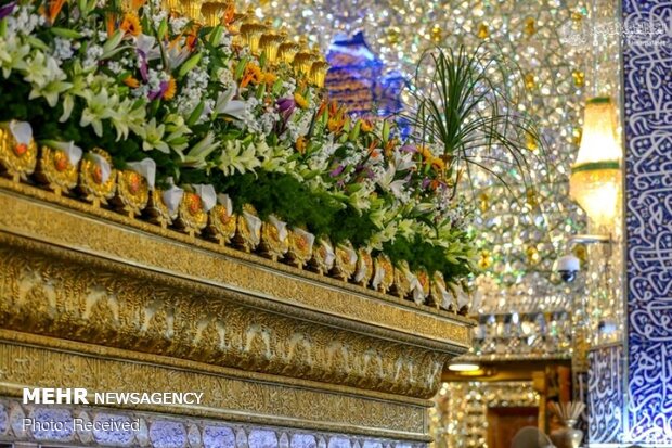 Imam Ali’s holy shrine ornamented with flowers
