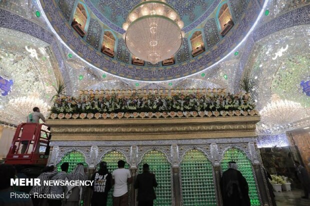 Imam Ali’s holy shrine ornamented with flowers
