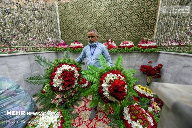 Imam Ali’s holy shrine ornamented with flowers
