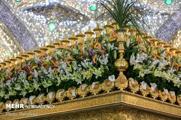 Imam Ali’s holy shrine ornamented with flowers
