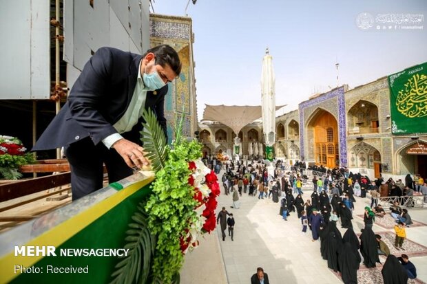 Imam Ali’s holy shrine ornamented with flowers
