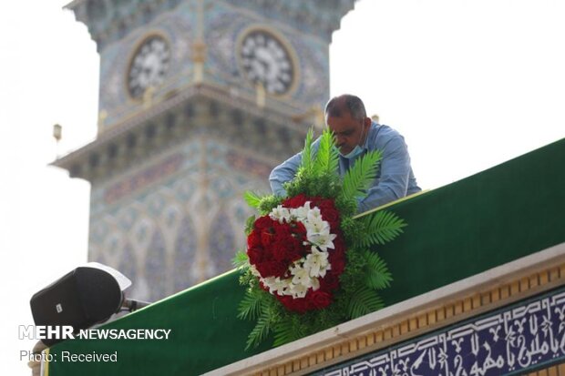 Imam Ali’s holy shrine ornamented with flowers
