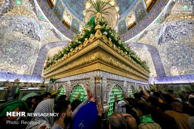 Imam Ali’s holy shrine ornamented with flowers
