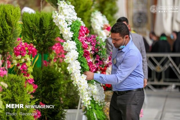 Imam Ali’s holy shrine ornamented with flowers
