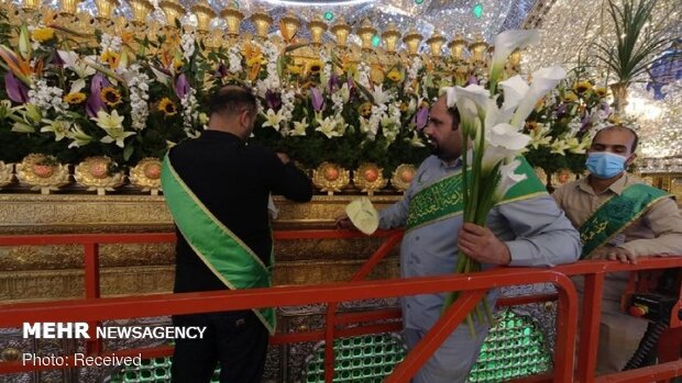 Imam Ali’s holy shrine ornamented with flowers
