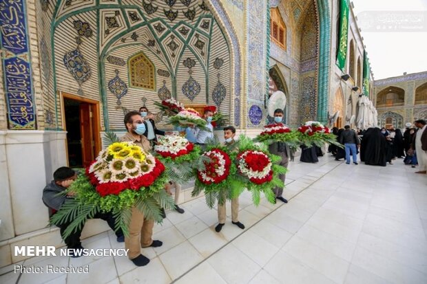 Imam Ali’s holy shrine ornamented with flowers
