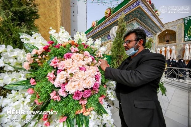 Imam Ali’s holy shrine ornamented with flowers
