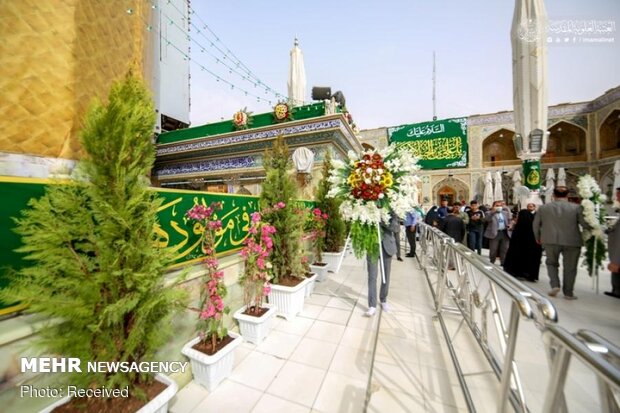 Imam Ali’s holy shrine ornamented with flowers
