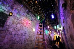 الفلسطينيون يستقبلون رمضان بأجواء احتفالية