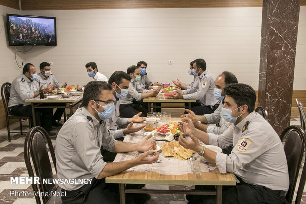 Fire Fighters having a different Iftar in fire station