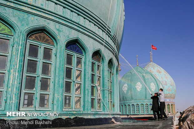 Ceremony of changing flag, washing dome of Jamkaran mosque