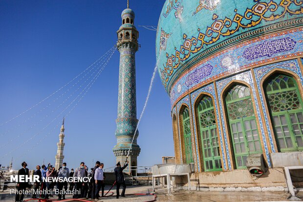 Ceremony of changing flag, washing dome of Jamkaran mosque