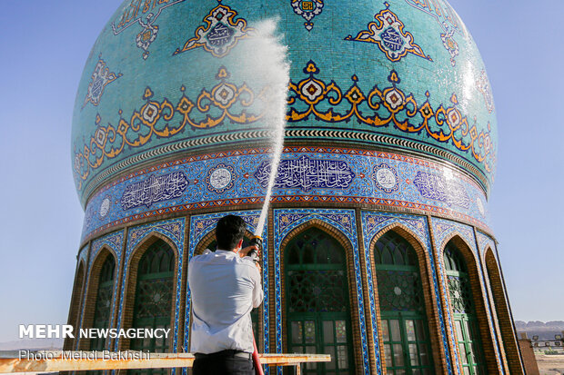 Ceremony of changing flag, washing dome of Jamkaran mosque