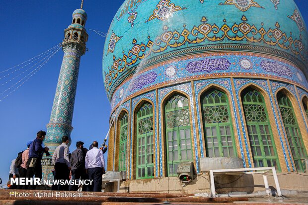 Ceremony of changing flag, washing dome of Jamkaran mosque