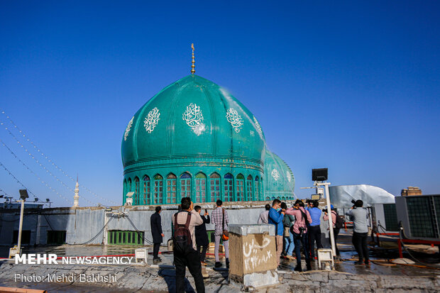 Ceremony of changing flag, washing dome of Jamkaran mosque