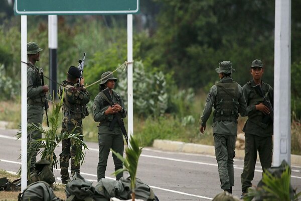 Venezuela says 8 soldiers captured in combat with Colombia
