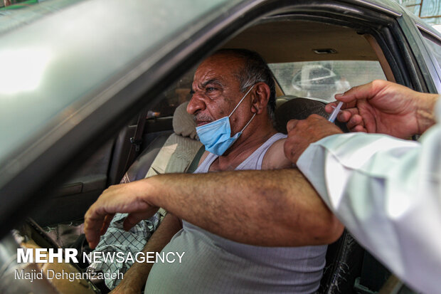 Drive-in coronavirus vaccination in Yazd prov.