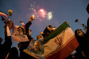 People celebrate Raeisi's victory in Tehran