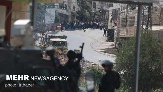 یک شهید و ۱۲ زخمی در حمله نظامیان صهیونیست به شمال الخلیل