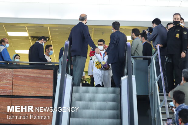 Welcoming gold medallist Javad Foroughi home