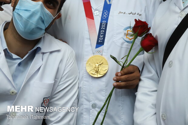 Welcoming gold medallist Javad Foroughi home