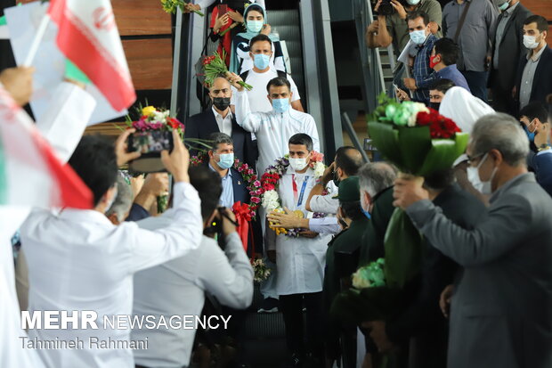 Welcoming gold medallist Javad Foroughi home