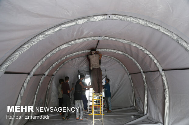 آماده سازی فضای نمایشگاهی بندرعباس برای بستری بیماران کرونایی