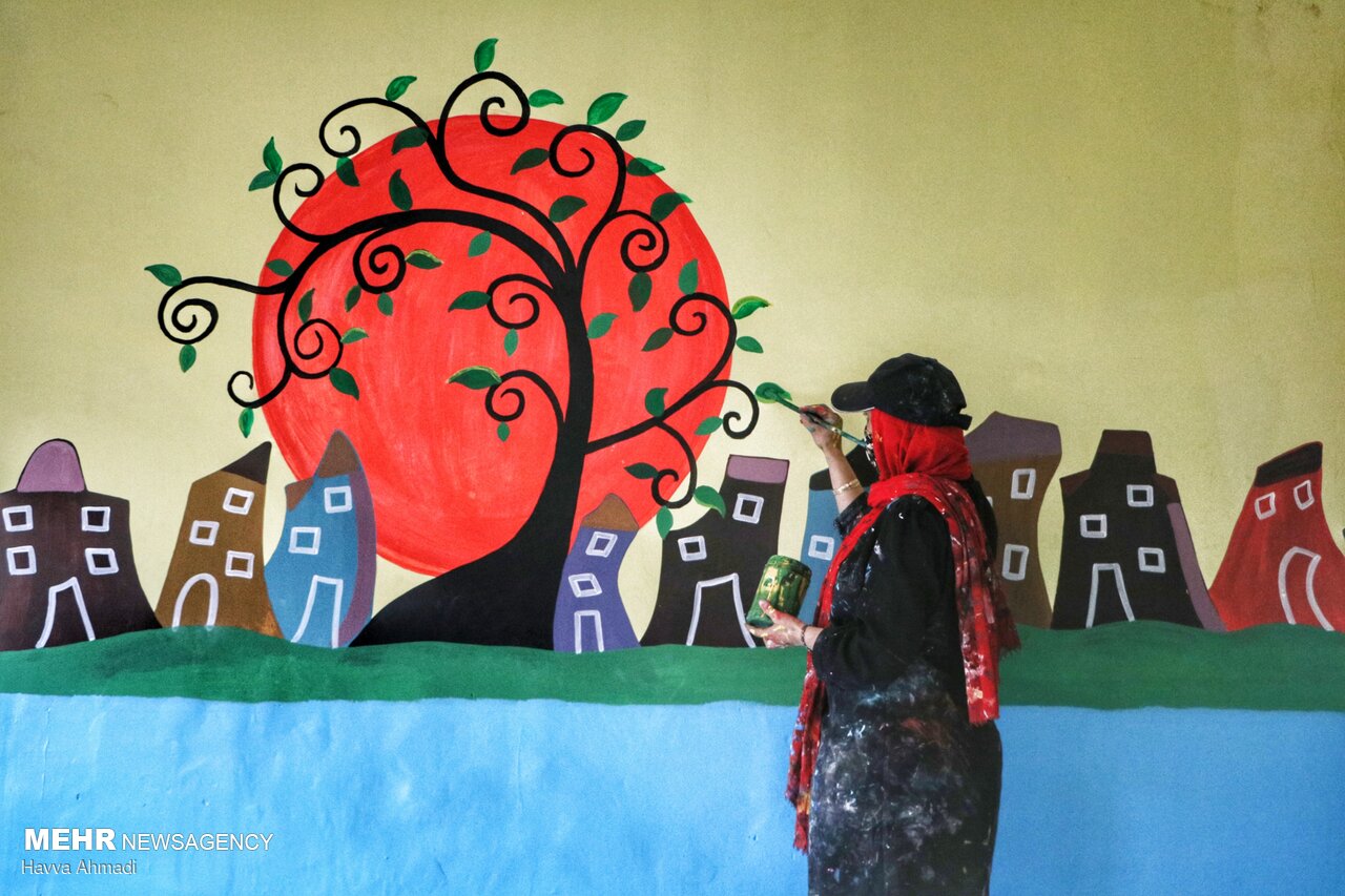 Local artists paint school walls before schools re-open