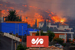 Lava from erupting volcano destroys homes in Canary Islands