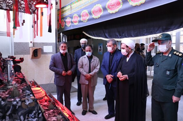 نمایشگاه و یادمان شهدای دادگستری استان قم افتتاح شد