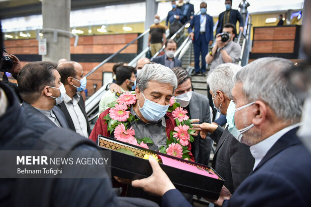 Members of Iranian Greco-Roman wrestling team arrive at home
