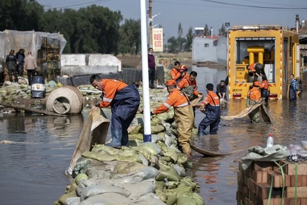 Dozen killed, nearly 2mn affected in heavy flood in China  