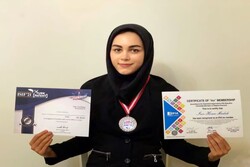 Iranian midwife wins silver medal at ISIF 2021