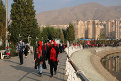 Families in Tehran take a free walking tour