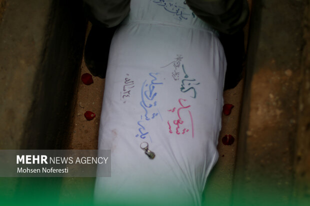 تدفین شهید گمنام در پایگاه شکاری شهید حسینی نیروی هوایی بیرجند