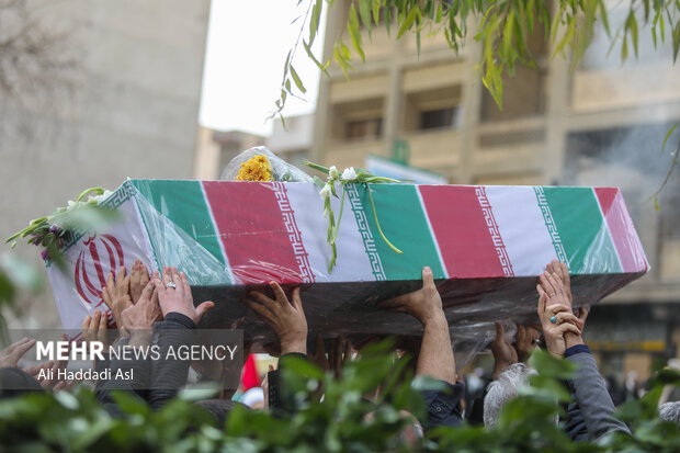 Bodies of 2 Holy Defense martyrs buried in interior ministry
